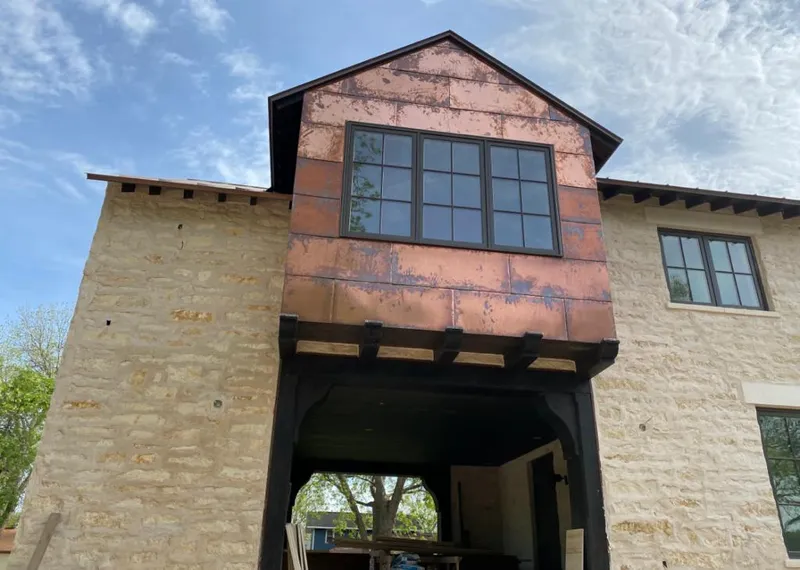Copper metal panel facade on a stone building for Metal Roof Coating in Camp Pendleton South